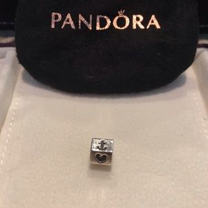 Authentic Pandora. Retired Cross/heart/anchor.